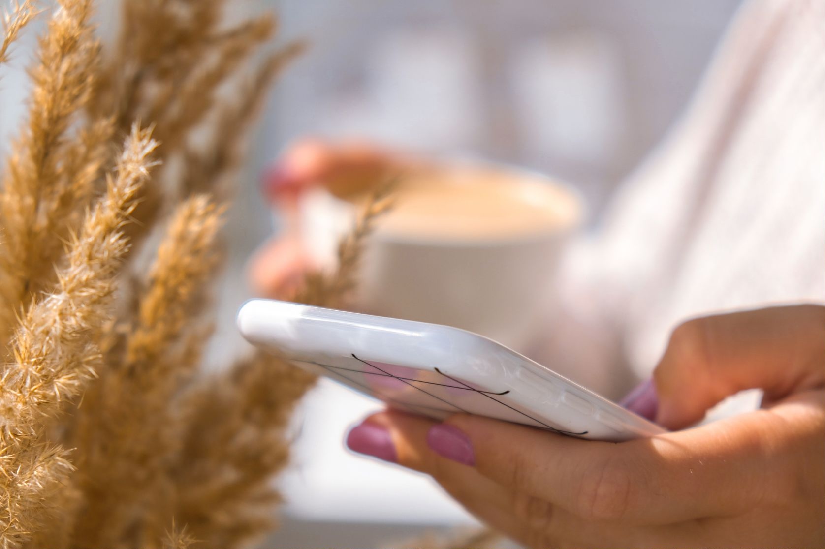 Woman using a smartphone in a calm home setting